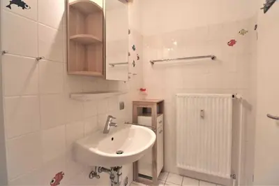 Ein Badezimmer in der Unterkunft Residenz Knechtsand 2