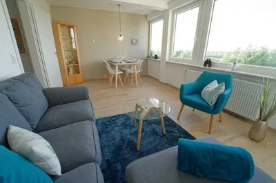 Ein Sitzbereich in der Unterkunft Residenz Nordfeldstraße - direkt am Deich