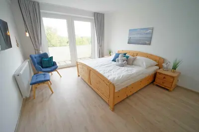Ein Bett oder Betten in einem Zimmer der Unterkunft Residenz Nordfeldstraße - direkt am Deich