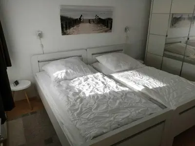 Ein Bett oder Betten in einem Zimmer der Unterkunft Residenz Strandnixe