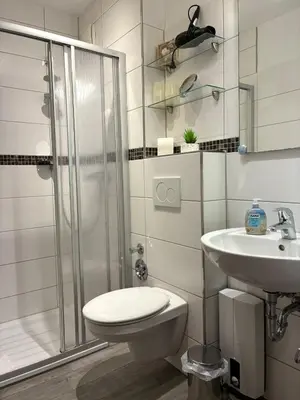 Ein Badezimmer in der Unterkunft Residenz Vogelsand 1