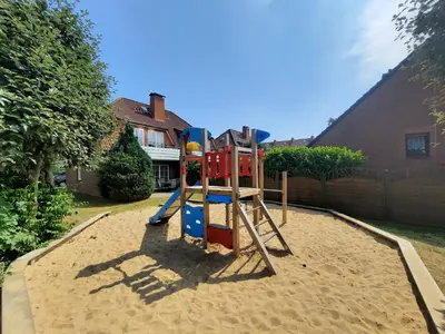 Ein Kinderspielbereich in der Unterkunft Residenz Vogelsand 1