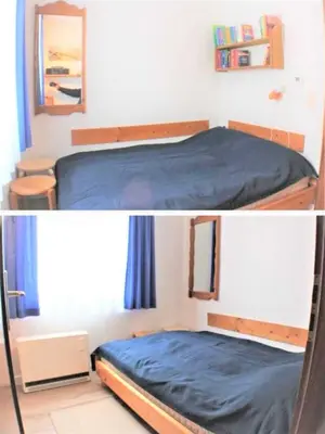 Ein Bett oder Betten in einem Zimmer der Unterkunft Residenz Vogelsand 2