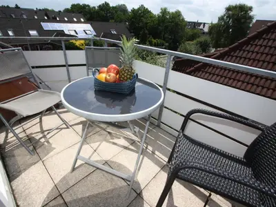 Ein Balkon oder eine Terrasse in der Unterkunft Residenz Vogelsand 3