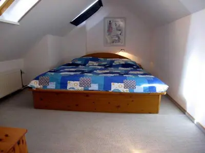 Ein Bett oder Betten in einem Zimmer der Unterkunft Residenz Scharhörn