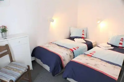 Ein Bett oder Betten in einem Zimmer der Unterkunft Residenz Pavillon
