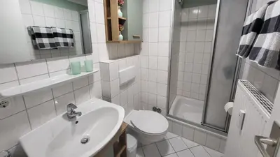Ein Badezimmer in der Unterkunft Residenz Stranddüne