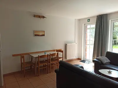 Ein Sitzbereich in der Unterkunft Tjarkshof