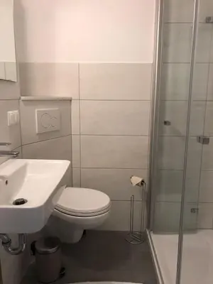 Ein Badezimmer in der Unterkunft Frische Brise FeWo 10.08