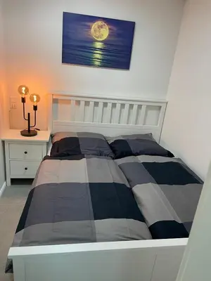 Ein Bett oder Betten in einem Zimmer der Unterkunft Apartmenthaus Frauenpreis FeWo 114