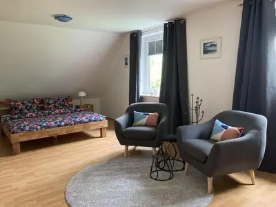 Ein Sitzbereich in der Unterkunft Ferienhaus Heinrichs