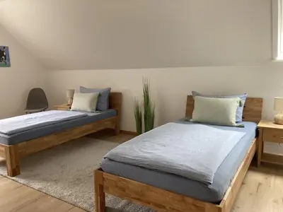 Ein Bett oder Betten in einem Zimmer der Unterkunft Ferienhaus Heinrichs