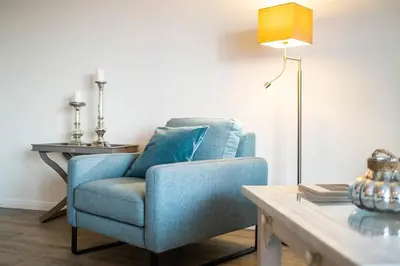 Ein Sitzbereich in der Unterkunft Weisse Villa Apartment 1 1 Lagune