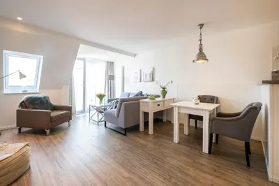Ein Sitzbereich in der Unterkunft Weisse Villa Apartment 3 1 Hafenkante