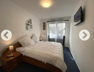 Ein Bett oder Betten in einem Zimmer der Unterkunft Villa Döser Strand Wohnung 5