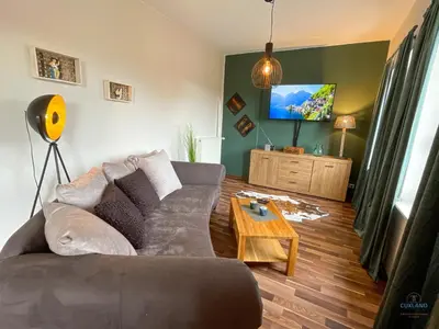 Ein Sitzbereich in der Unterkunft Strandbude 2 Döse