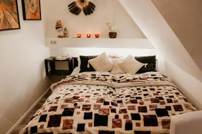 Ein Bett oder Betten in einem Zimmer der Unterkunft Forsthaus-Ferienhotel am Dobrock