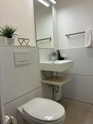 Ein Badezimmer in der Unterkunft Residenz Steinmarne Cuxhaven 3