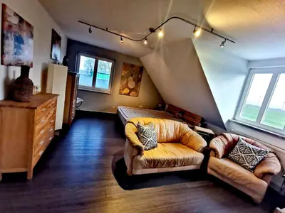Ein Sitzbereich in der Unterkunft Ferienwohnung an der Barlter Mühle im ersten OG Nähe Nordsee