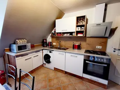 Küche/Küchenzeile in der Unterkunft Ferienwohnung an der Barlter Mühle im ersten OG Nähe Nordsee