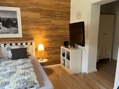 Ein Bett oder Betten in einem Zimmer der Unterkunft Appartement 1 mit Küche und neuem Bad, frisch saniert
