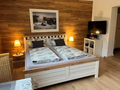 Ein Bett oder Betten in einem Zimmer der Unterkunft Appartement 1 mit Küche und neuem Bad, frisch saniert