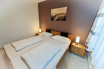 Ein Bett oder Betten in einem Zimmer der Unterkunft Flockengrund S3BU