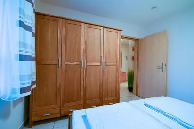 Ein Bett oder Betten in einem Zimmer der Unterkunft Flockengrund S3BU