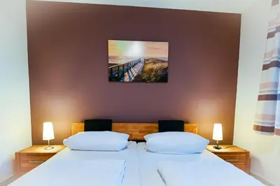 Ein Bett oder Betten in einem Zimmer der Unterkunft Flockengrund S3BU