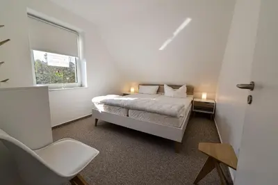 Ein Bett oder Betten in einem Zimmer der Unterkunft Flockengrund V42O
