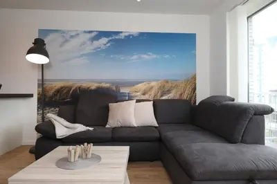Ein Sitzbereich in der Unterkunft Ferienwohnung Quartier Hohe Geest 20 - Sahlenburg - a69835