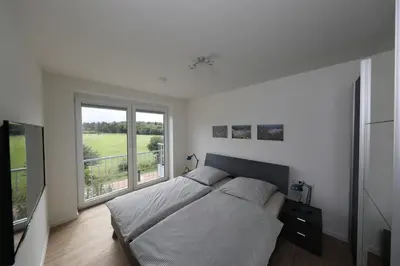 Ein Bett oder Betten in einem Zimmer der Unterkunft Quartier Hohe Geest 9 - Wolke 9 - a69836