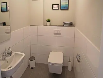 Ein Badezimmer in der Unterkunft Quartier Hohe Geest 18 - Strandzeit - a69837