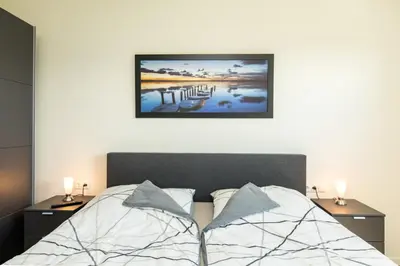 Ein Bett oder Betten in einem Zimmer der Unterkunft Quartier Hohe Geest 16 - Lena - a69851