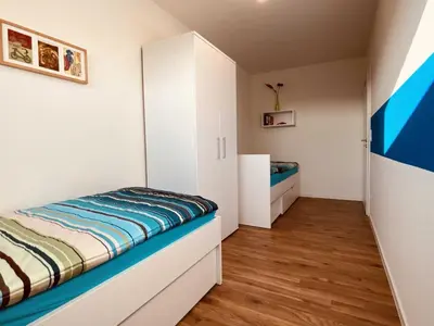 Ein Bett oder Betten in einem Zimmer der Unterkunft Quartier Hohe Geest 8 - a69853