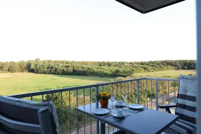 Ein Balkon oder eine Terrasse in der Unterkunft Quartier Hohe Geest 17 - Nord Seestern - a69854