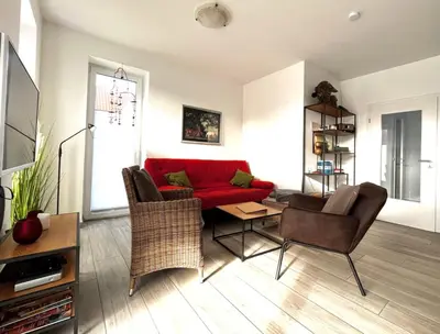 Ein Sitzbereich in der Unterkunft Ferienhaus De Beers Huus - Holte-Spangen - a69919