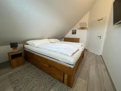 Ein Bett oder Betten in einem Zimmer der Unterkunft Ferienhaus De Beers Huus - Holte-Spangen - a69919