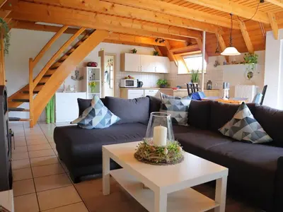 Ein Sitzbereich in der Unterkunft Ferienhaus Poseidon