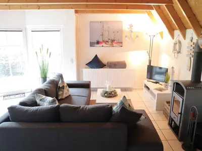 Ein Sitzbereich in der Unterkunft Ferienhaus Poseidon