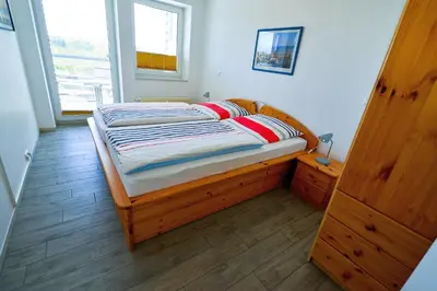 Ein Bett oder Betten in einem Zimmer der Unterkunft Haus Nordseebrandung NC35
