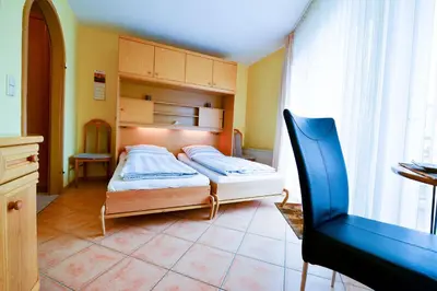 Ein Bett oder Betten in einem Zimmer der Unterkunft Haus Residenz Meeresbrandung MB31