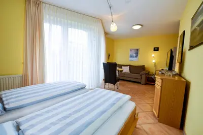 Ein Bett oder Betten in einem Zimmer der Unterkunft Haus Residenz Meeresbrandung MB31
