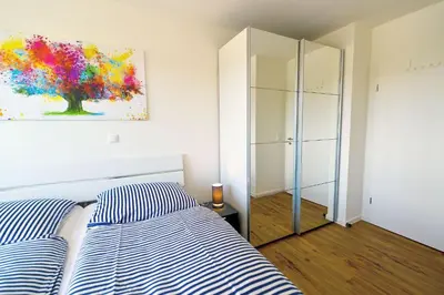 Ein Bett oder Betten in einem Zimmer der Unterkunft Haus Hohe Geest HG10