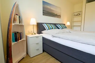 Ein Bett oder Betten in einem Zimmer der Unterkunft Haus Hohe Geest HG11