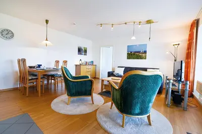 Ein Sitzbereich in der Unterkunft Haus Nordseebrandung NA34