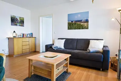 Ein Sitzbereich in der Unterkunft Haus Nordseebrandung NA34