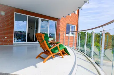 Ein Balkon oder eine Terrasse in der Unterkunft Haus Nordseebrandung NA44