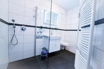 Ein Badezimmer in der Unterkunft Haus Nordseebrandung NA61