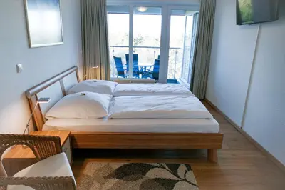 Ein Bett oder Betten in einem Zimmer der Unterkunft Haus Nordseebrandung NA63